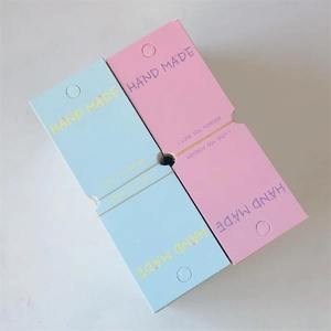 Pink and light blue handmade folding display cards for hair clips and jewelry packaging