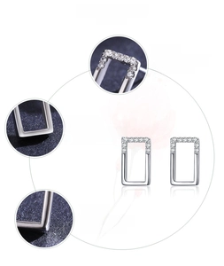 Macro detail of geometric square 925 sterling silver earrings with 5A zircon inlay