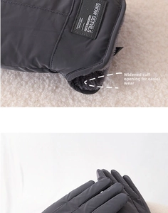 Detail of dark grey winter gloves featuring split wrist design and warm fleece lining