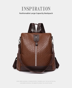 Close-up of dark brown woven texture detail on women's vintage PU leather backpack