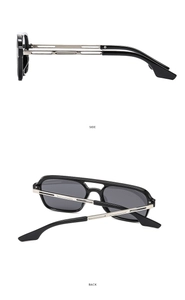 Detail view of vintage double-bridge aviator sunglasses with hollow silver metal temples