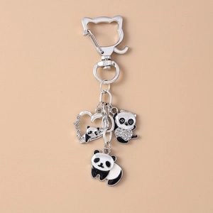 Sparkling rhinestone panda keychains set with black enamel details on silver alloy hooks