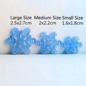 Translucent glitter resin snowflake charms in large, medium and small sizes