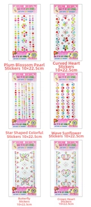 Detail of 6 colorful acrylic crystal sticker sheets with heart and flower designs