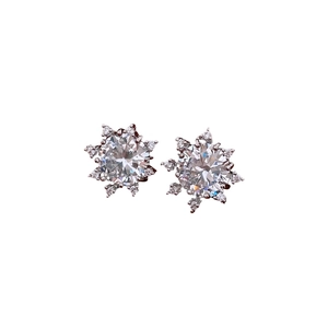 French style silver snowflake earrings with sparkling cubic zirconia in a minimalist design