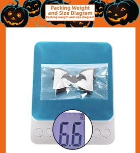 Close-up of Halloween glitter bat wing bow clip showing packaging weight 6.6g