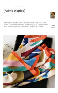 Detail of artistic silk square scarf showing soft texture and geometric patterns