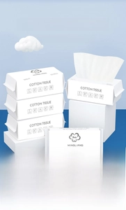 Close-up of thick disposable facial towels in blue soft packaging with 100 cotton tissues
