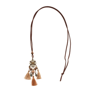Bohemian floral pendant sweater necklace with long tassels on a white background