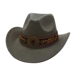 Detail of grey felt cowboy hat with embroidered ethnic band and red gemstone buckle