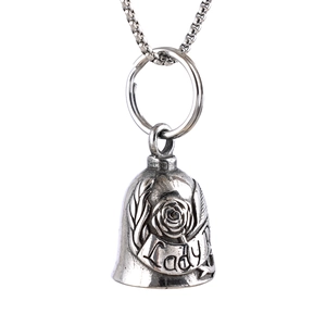 Detailed view of motorcycle guardian bell pendant with rose relief and Lady engraving