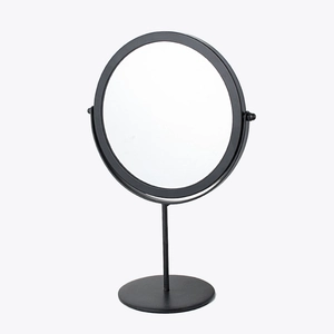 Minimalist black desktop makeup mirror with a stable round base and metal frame