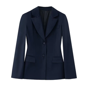 Detailed flat lay of navy blue blazer featuring two-button closure and padded shoulders