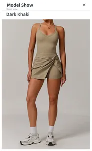 Detail of dark khaki tennis dress with twist design and crossover open back detail