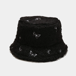 Women's black teddy fleece bucket hat with white butterfly embroidery for winter outdoor wear