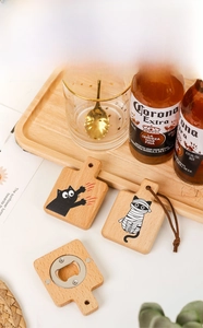 Artisan wooden cat claw bottle opener with creative cartoon illustrations in warm wood tones
