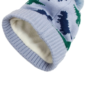 Close-up of the thick white fleece lining inside a blue knitted dinosaur baby hat