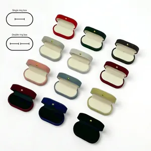Elegant velvet ring boxes with gold clasp in multiple colors for jewelry gift packaging