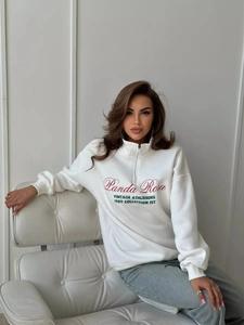 White half-zip sweatshirt with vintage Panda Rosa print in a relaxed fit for women