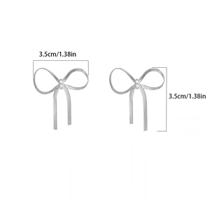 Detailed view showing dimensions of silver bow earrings measuring 3.5cm by 1.38 inches