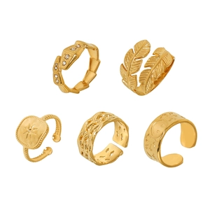 Five-piece gold PVD plated stainless steel ring set with snake, star, and moon patterns
