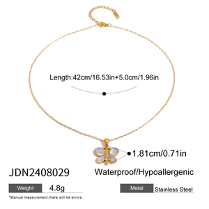 Golden stainless steel butterfly necklace with natural stone details and zirconia stones