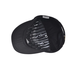 Internal view of black cotton sun hat showing clean stitching and quality washing label