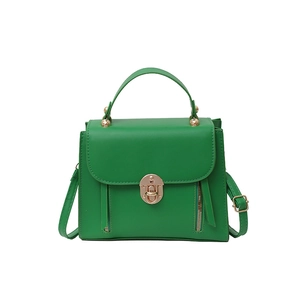Elegant green square shoulder bag with gold metal clasp and top handle for women