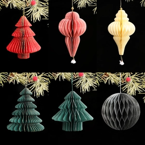 Elegant Christmas honeycomb paper ornaments with gold edges in tree and lantern shapes