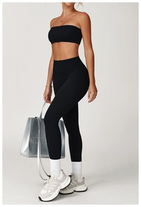 Side view of black brushed yoga set with high-waist leggings and crop top sports bra