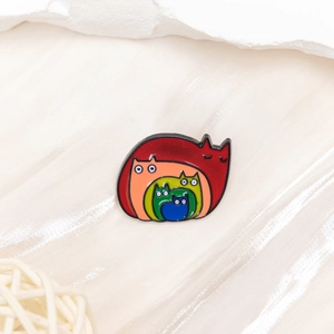 Rainbow cat enamel pin featuring five nested kittens in colorful glossy lacquer