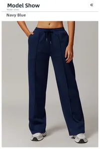 Navy blue high-waisted wide leg sweatpants with white drawstring and front seam details
