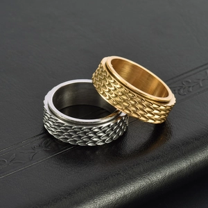 Vintage stainless steel dragon scale spinner rings in gold and silver finish