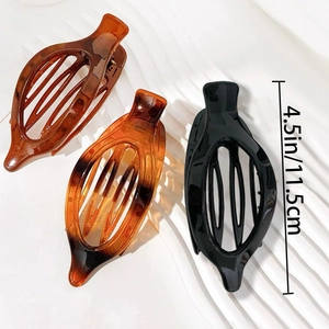 Tortoiseshell and black oval 4.5 inch hair clips for women in professional studio view