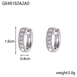 Silver row diamond hoop earrings with 1.6cm diameter and 0.4cm width detail view