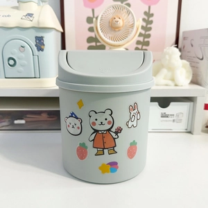 Cute mini desktop trash can with press-top lid and cartoon stickers for office desk