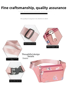 Detail view of pink oxford waist bag showing adjustable strap, buckle, and metal zippers