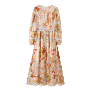 Bohemian floral maxi dress with long sleeves, high waist and delicate lace trim