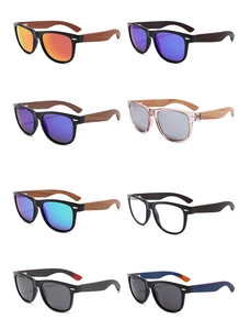 Various polarized sunglasses with oval frames and natural wood temples in multiple colors