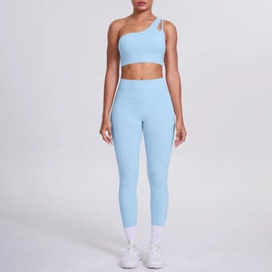 Light blue one-shoulder yoga set with cutout sports bra and high-waisted leggings