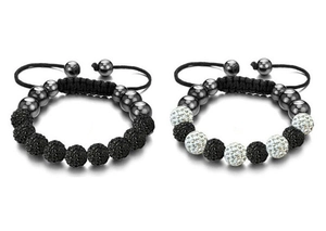 Close-up of DIY woven bracelets with black lava stone beads and sparkling rhinestones