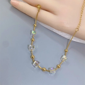 Elegant gold titanium bracelet with color-changing sugar cube crystal for women