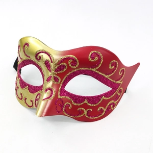 Elegant red and gold masquerade mask with glitter swirls for parties and dances