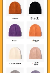 Detailed view of ribbed knit beanies in multiple colors including orange and pink