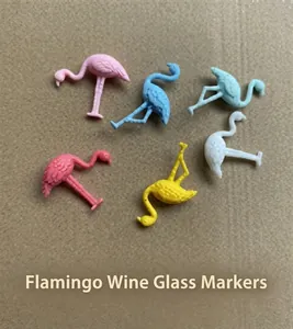 Close-up of colorful flamingo silicone wine glass markers for party drink identification