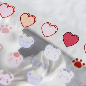 Self-adhesive nail art stickers featuring transparent colorful hearts and cartoon bears