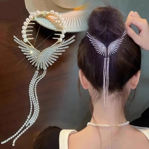Sparkling wing hair claw clip with rhinestones and pearl tassels for bun hairstyles