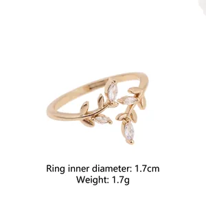 Elegant gold leaf adjustable open ring with leaf pattern and marquise cubic zirconia