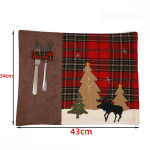 Detailed Christmas placemat with red plaid, embroidery trees, and built-in cutlery pocket