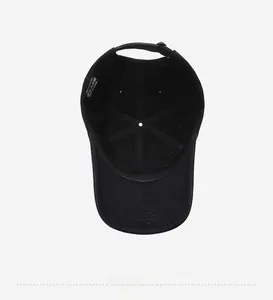 Internal view of a vintage distressed baseball cap showing 100% cotton label and stitching